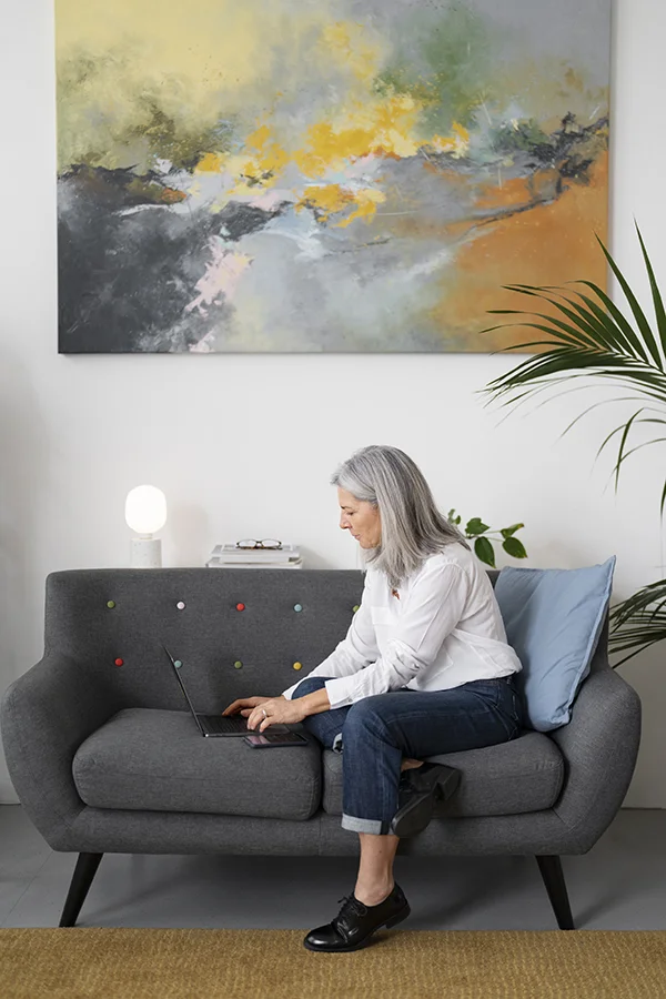 Woman working on a laptop at a desk